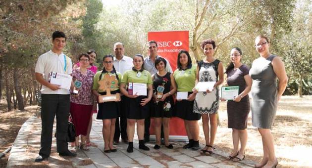 Student participants in this year’s YRE International competition pose with their certificates and trophies during the 2016-2017 YRE Malta awards ceremony