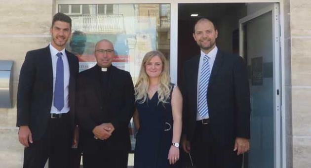 Mark Tanti, executive Branches, Fr Daniel Cardona, Zebbug archpriest, Angele Conti, Branch officer and Keith P. Tanti, manager Branches and Intermediaries