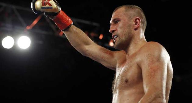 Sergey Kovalev, of Russia, celebrates after defeating Igor Mikhalkin, of Russia, in the seventh round of a WBO light heavyweight title boxing match Saturday, March 3, 2018, in New York. (AP Photo/Adam Hunger)