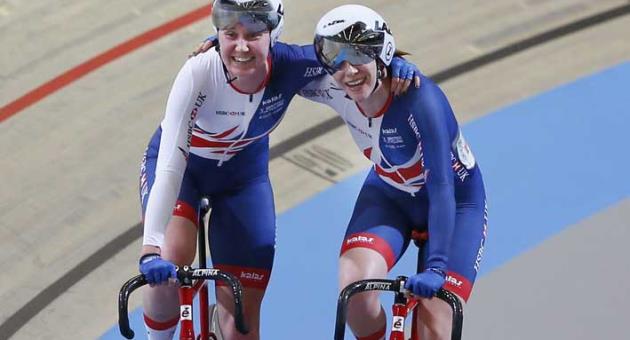 World champions Katie Archibald, left, and Emily Nelson of Britain celebrate after winning the women's madison final at the World Championships Track Cycling in Apeldoorn, eastern Netherlands, Netherlands, Saturday, March 3, 2018. (AP Photo/Peter Dejong)