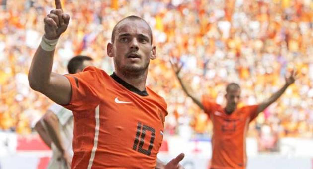 In this Saturday June 5, 2010 file photo Wesley Sneijder of The Netherlands celebrates scoring during the friendly soccer match Netherlands versus Hungary at ArenA stadium in Amsterdam, Netherlands. Midfielder Wesley Sneijder is retiring from international football after 15 years and a record 133 appearances for the Netherlands. The Dutch football association announced the retirement Sunday after new coach Ronald Koeman visited 33-year-old Sneijder in Qatar, where he plays for Al Gharafa. (AP Photo/Peter Dejong)