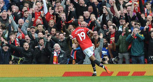 Manchester United's Marcus Rashford celebrates after scoring his sides second goal during the English Premier League soccer match between Manchester United and Liverpool at Old Trafford in Manchester, England, Saturday, March 10, 2018. (AP Photo/Rui Vieira)