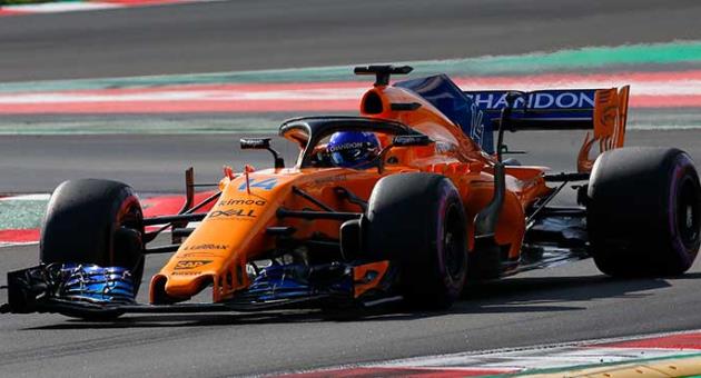 McLaren driver Fernando Alonso of Spain steers his car during a Formula One pre-season testing session in Montmelo, outside Barcelona, Spain, Friday, March 9, 2018. (AP Photo/Manu Fernandez)