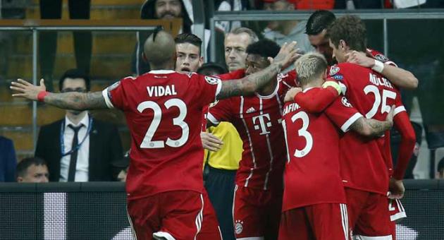 Bayern's players celebrate the third goal of their team during the Champions League, round of 16, second leg, soccer match between Besiktas and Bayern Munich at Vodafone Arena stadium in Istanbul, Wednesday, March 14, 2018. Bayern won 3-1. (AP Photo/Lefteris Pitarakis)