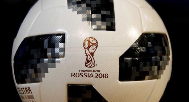 The current official game ball bearing the logo of the Russia 2018 soccer World Cup is on display during the annual adidas balance news conference in Herzogenaurach, Germany, Wednesday, March 14, 2018. (AP Photo/Matthias Schrader)