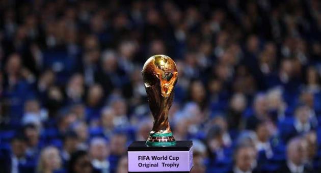 In this Friday Dec. 1, 2017 file photo, the World Cup trophy is placed on display during the 2018 soccer World Cup draw in the Kremlin in Moscow. Morocco says it will have to spend $16 billion to prepare the country to host the 2026 World Cup, with every proposed stadium and training ground needing to be built from scratch or renovated. With less than three months until the FIFA vote, the north African nation presented details of its proposal to take on the joint bid from the United States, Canada and Mexico. (AP Photo/Alexander Zemlianichenko, file)