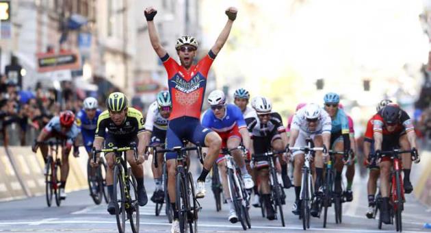 Vincenzo Nibali celebrates as he crosses the finish line to win the Milan-San Remo cycling race, in Sanremo, March 17, 2018. Nibali carried off a daring solo attack to perfection to win the Milan-San Remo classic Saturday and add to his long list of major achievements in cycling. (Luca Bettini/ANSA via AP)