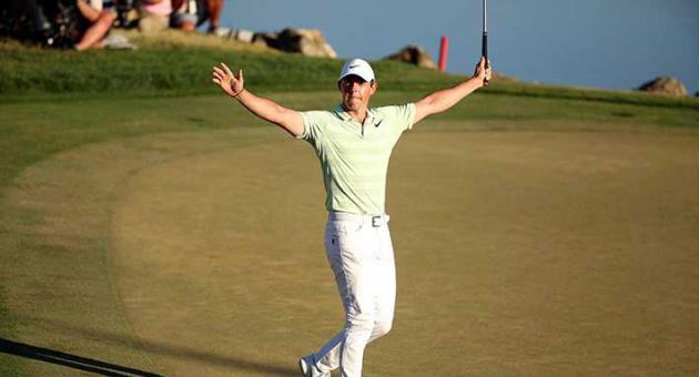 Rory McIlroy celebrates after sinking a birdie putt on the 18th green to win the Arnold Palmer Invitational at Bay Hill Club & Lodge in Orlando on Sunday, March 18, 2018. (Stephen M. Dowell /Orlando Sentinel via AP)