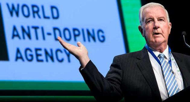 Craig Reedie, world anti-doping agency (WADA) President, delivers his speech during the opening day of the 2018 WADA annual symposium, at the Swiss Tech Convention Center, in Lausanne, Switzerland, on Wednesday March 21, 2018. (Jean-Christophe Bott/Keystone via AP)