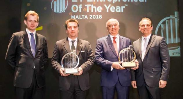 Shane Hunter from AquaBioTech Group, winner of EY’s Rising Star award and Angelo Xuereb, Chairman of AX Holdings, winner of EY’s Malta Entrepreneur of the Year™ award, flanked by (first from left) Andrew C. Beane, CEO of HSBC Bank Malta plc and Ronald Attard, EY Malta’s Managing Partner. 