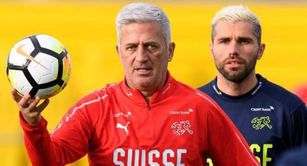 Swiss national team head coach Vladimir Petkovic, left, and player Valon Behrami attend a training session at the AEK FC Training Center, in Athens, Greece, Wednesday, March 21, 2018. Switzerland will face Greece in Athens on March 23, 2018 for an International friendly soccer match. (Laurent Gillieron/Keystone via AP)