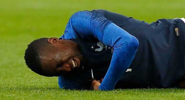 France's Blaise Matuidi grimaces in pain during a friendly soccer match between France and Colombia in Saint-Denis, outside Paris, Friday March 23, 2018. (AP Photo/Michel Euler)