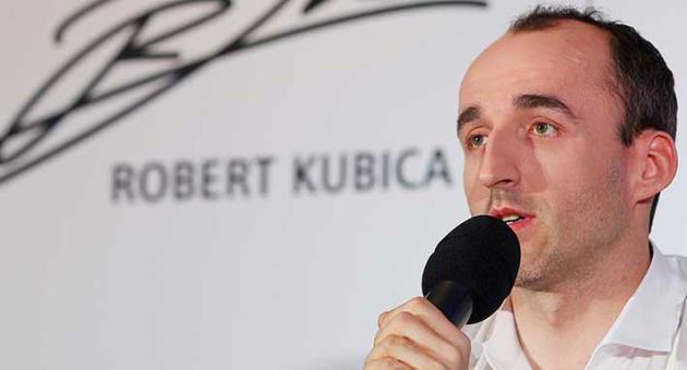 F1 reserve driver for Williams, Robert Kubica who almost lost his right hand in a 2011 rally crash, talks to reporters about his motivation for the comeback and his dream of returning to racing, in Warsaw, Poland, Thursday, March 29, 2018. (AP Photo/Czarek Sokolowski)