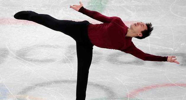 In this Feb. 17, 2018, file photo, Patrick Chan, of Canada, performs during the men's free figure skating final in the Gangneung Ice Arena at the 2018 Winter Olympics in Gangneung, South Korea. Chan, who won his long-awaited Olympic gold as part of the team event at the Pyeongchang Olympics, is retiring after more than a decade on the world stage. Chan made his decision official Monday, April 16, 2018, after alluding to it during the Winter Games. (AP Photo/Julie Jacobson, File)