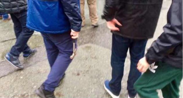 Fan seen clutching hammer as Liverpool supporter is 'attacked by Roma ultras' outside Anfield
