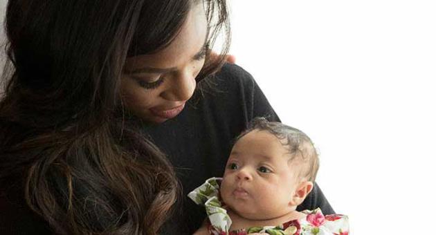 In a photo provided by HBO date not provided, Serena Williams holds her daughter, Alexis Olympia Ohanion Jr., in a scene from the HBO's 