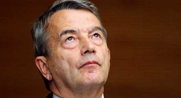 In this Nov. 9, 2015 file photo, the then President of German soccer federation Wolfgang Niersbach announces during a news conference that he is stepping back from his post as president in Frankfurt, Germany. (AP Photo/Michael Probst, file)