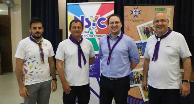 Sean Bartolo - NSYC Chair; Leslie Bonnici - outgoing chief commissioner; Anton Pisani - chief commissioner and George Cassar - Chief scout