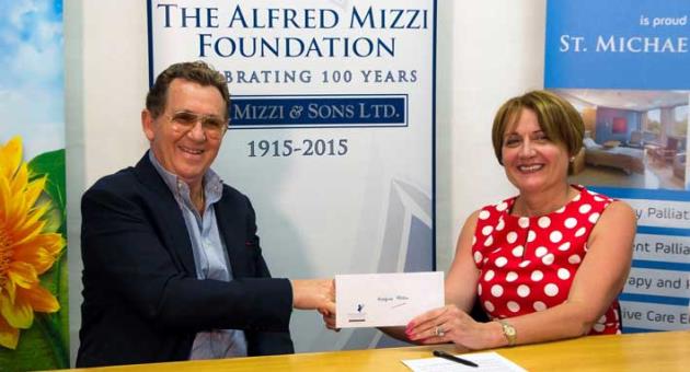 Julian Sammut and Ms. Maria Gatt during the presentation of The Alfred Mizzi Foundation's sponsorship.