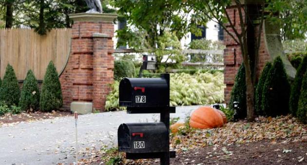 Mailboxes stand outside the entrance to a house owned by philanthropist George Soros in Katonah, N.Y., a suburb of New York City, Tuesday, Oct. 23, 2018. 