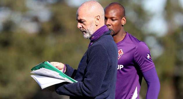 ACF Fiorentina head coach Stefano Pioli assesses Burkinabe's Bryan Dabo's performance during a training session in Malta. Photo: Domenic Aquilina