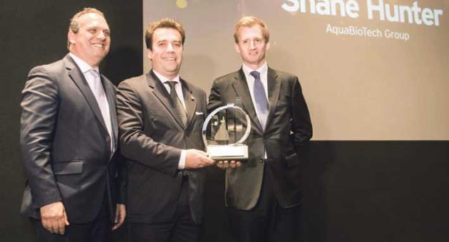Shane Hunter (centre) with (from left) EY Malta Managing Partner Ronald Attard and HSBC Bank Malta Chief Executive Andrew C. Beane