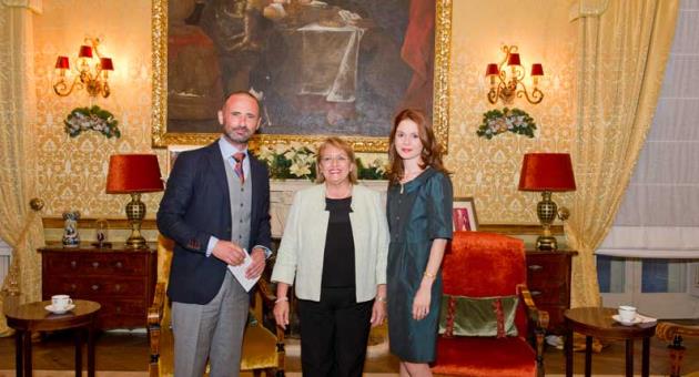 Claudia Attard from FBIC Ltd and Mark Vassallo from Vascas presenting the cheque of €7,800 to the President of the Republic of Malta, Marie Louise Coleiro-Preca. The funds were collected during the auction of the Chivalry Bremont Limited Edition watch with all proceedings going towards the MCCF