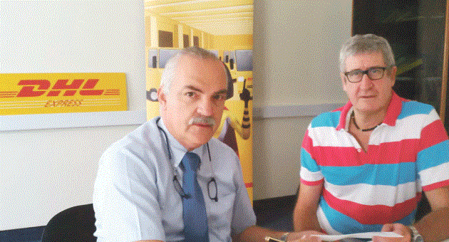 DHL Express Country Manager, Malta, Charles Schiavone (on left) with Malta Marathon Race Director Joe Micallef signing the sponsorship agreement at DHL Express offices in Luqa