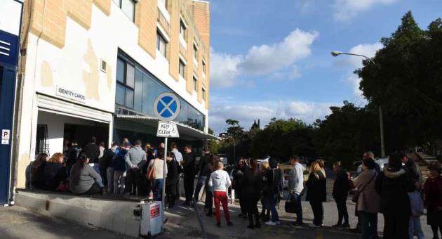 Queue outside ID Card office gets longer despite authorities denying fine  for late changers - The Malta Independent