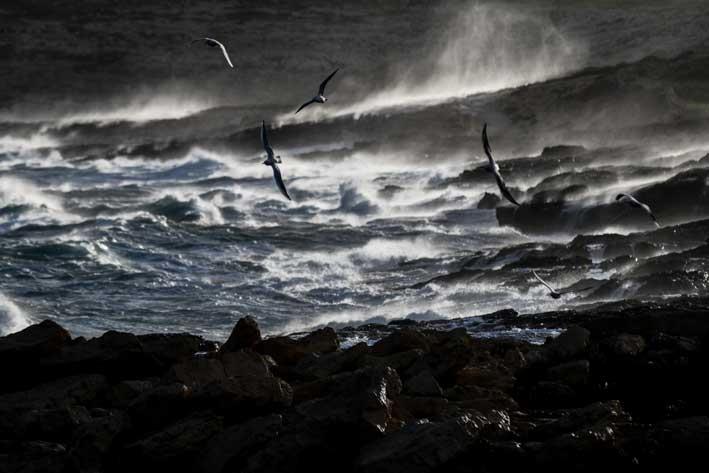 Cold snap: Dark clouds, raging seas and a rainbow captured on camera - The Malta Independent