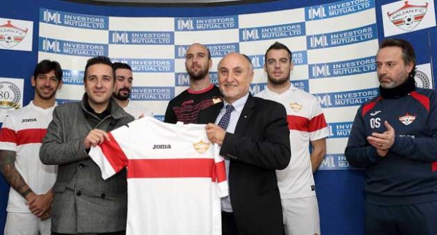 Joma representative Paola Tagliatela (2nd L) presents the new Balzan FC kit to club President Anton Tagliaferro. Photo © Domenic Aquilina