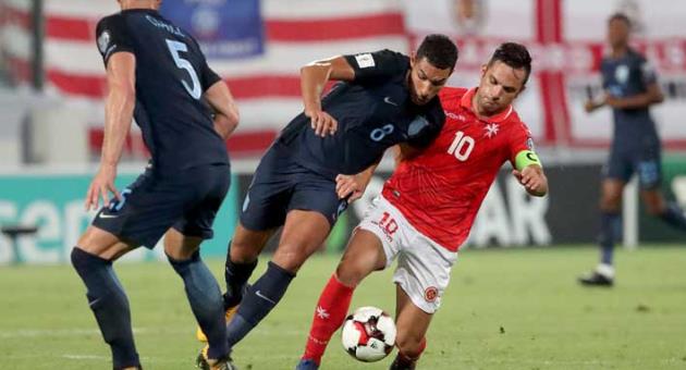 Andre Schembri in action against England at Ta' Qali on 1st September. Photo: Domenic Aquilina