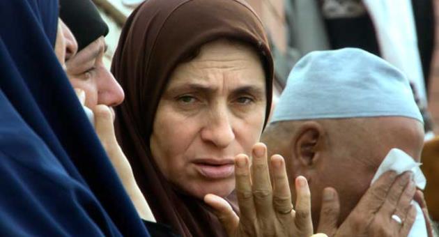 Relatives of injured worshippers grieve outside the Suez Canal University hospital in Ismailia, Egypt, Saturday, Nov. 25, 2017, a day after an attack on a mosque.