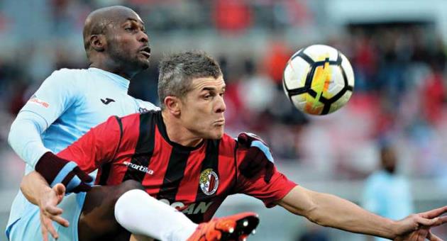 Gzira United's Souleymane Diamoutene (L) goes in hard with his challenge against David Succi of Hamrun Spartans. Photo: Domenic Aquilina