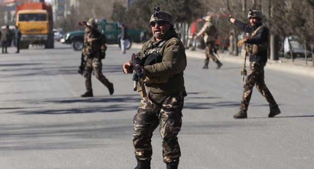Security personnel arrive outside the site of a suicide attack in kabul, Afghanistan, Thursday, Dec. 28, 2017