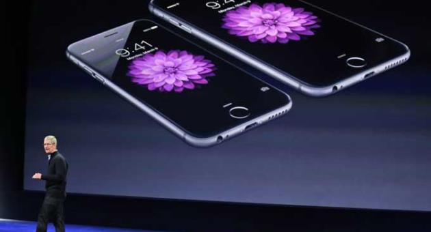 In this March 9, 2015, file photo, Apple CEO Tim Cook talks about the iPhone 6 and iPhone 6 Plus during an Apple event in San Francisco.