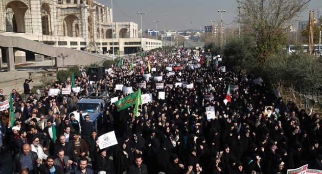 Iranian protesters chant slogans at a rally in Tehran, Iran, Saturday, Dec. 30, 2017. Iranian hard-liners rallied Saturday to support the country's supreme leader and clerically overseen government as spontaneous protests sparked by anger over the country's ailing economy roiled major cities in the Islamic Republic.
