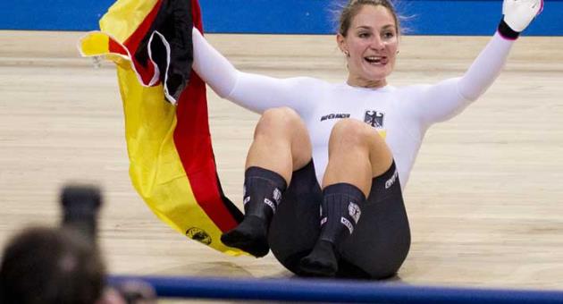 World champion and gold medalist Kristina Vogel of Germany celebrates after the women's sprint final at the World Championships Track Cycling in Apeldoorn, eastern Netherlands, Netherlands, Friday, March 2, 2018. (AP Photo/Peter Dejong)