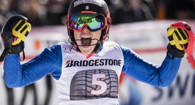 Federica Brignone of Italy celebrates in the finish area after the women's Alpine Combined Slalom race of the Alpine Skiing World Cup in Crans-Montana, Switzerland, Sunday, March 4, 2018. (Alessandro della Valle/Keystone via AP)