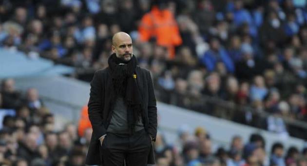 Manchester City manager Josep Guardiola looks during the English Premier League soccer match between Manchester City and Chelsea at the Etihad Stadium in Manchester, England, Sunday, March 4, 2018. (AP Photo/Rui Vieira)