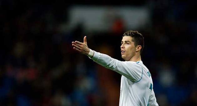 Real Madrid head coach Zinedine Zidane gives instructions from the side line during the Spanish La Liga soccer match between Real Madrid and Getafe at the Santiago Bernabeu stadium in Madrid, Saturday, March 3, 2018. Real Madrid won 3-1. (AP Photo/Francisco Seco)