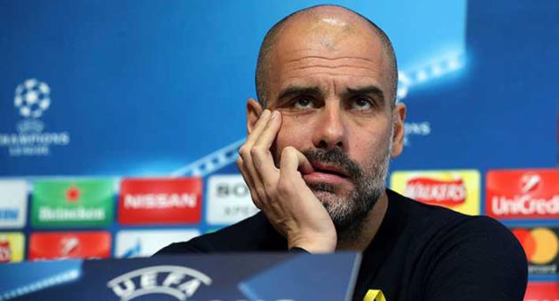 Manchester City soccer team manager Pep Guardiola reacts during the press conference in Manchester, England, Tuesday March 6, 2018. Manchester City play Basel in a Champions League clash upcoming Wednesday. (Martin Rickett/PA via AP)