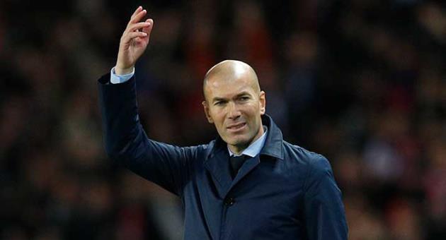 Real Madrid head coach Zinedine Zidane gestures during the Champions League round of sixteen second leg soccer match between Paris St. Germain and Real Madrid at the Parc des Princes stadium in Paris, France, Tuesday, March 6, 2018. (AP Photo/Christophe Ena)