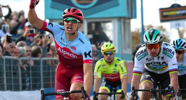 Marcel Kittel, of Germany, celebrates as he sprints ahead of Peter Sagan to win the 2nd stage of the Tirreno-Adriatico cycling race, from Camaiore to Follonica, Italy, Thursday, March 8, 2018. (Dario Belingheri/ANSA via AP)