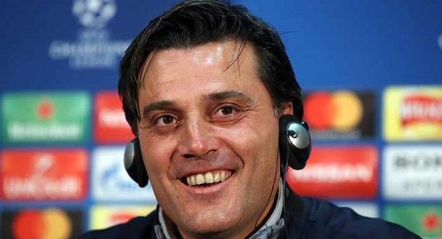 Sevilla head coach Vincenzo Montella attends a press conference at Old Trafford, Manchester, England, Monday, March 12, 2018. Sevilla will play Manchester United in a Champions League round of 16, second leg soccer match on Tuesday. (Martin Rickett/PA via AP)