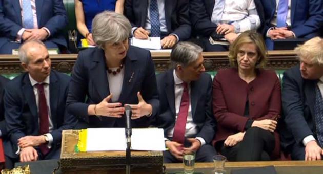 Britain's Prime Minister Theresa May speaks during the scheduled Prime Minister's Questions in the House of Commons, London, Wednesday March 14, 2018. May is widely expected to announce a range of economic and diplomatic measures against Russia, in response to the nerve-agent on former Russian spy Sergei Skripal and his daughter Yulia. (PA via AP)