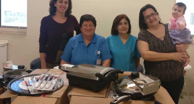 Left to Right- Jackie Attard Montalto, Atlas Marketing and HR Manager, Rose Bugeja, Pauline Falzon - nurses at the Rainbow Ward, parent Elizabeth Bezzina and baby Thea
