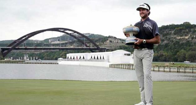 Bubba Watson poses with his trophy after winning the during the final round at the Dell Technologies Match Play golf tournament, Sunday, March 25, 2018, in Austin, Texas. Watson defeated Kevin Kisner. (AP Photo/Eric Gay)