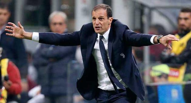 In this Saturday, Oct. 28, 2017 file photo, Juventus coach Massimiliano Allegri gestures to his players from the sidelines during a Serie A soccer match between AC Milan and Juventus, at the Milan San Siro stadium, Italy, Saturday, Oct. 28, 2017. 