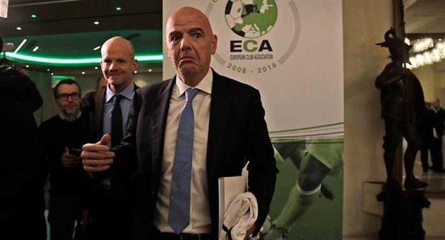 FIFA president Gianni Infantino leaves at the end of European Club Association's (ECA) 20th General Assembly, in the organization's 10-year anniversary in Rome, Tuesday, March 27, 2018. (AP Photo/Alessandra Tarantino)